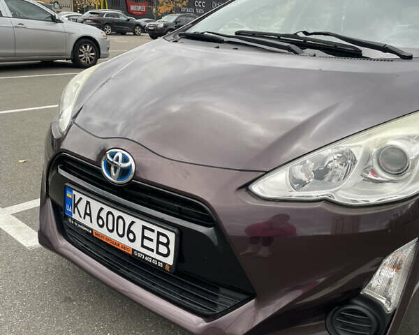 Фиолетовый Тойота Aqua, объемом двигателя 1.5 л и пробегом 83 тыс. км за 11900 $, фото 7 на Automoto.ua