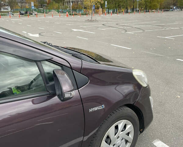 Фиолетовый Тойота Aqua, объемом двигателя 1.5 л и пробегом 83 тыс. км за 11900 $, фото 6 на Automoto.ua