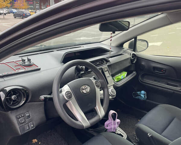 Фиолетовый Тойота Aqua, объемом двигателя 1.5 л и пробегом 83 тыс. км за 11900 $, фото 12 на Automoto.ua