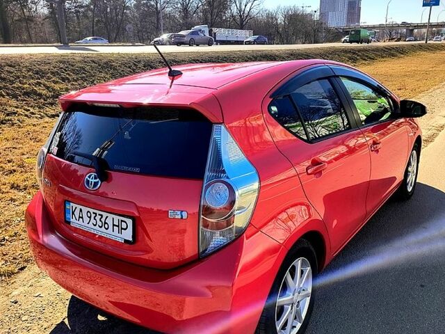 Красный Тойота Aqua, объемом двигателя 1.5 л и пробегом 125 тыс. км за 9900 $, фото 5 на Automoto.ua