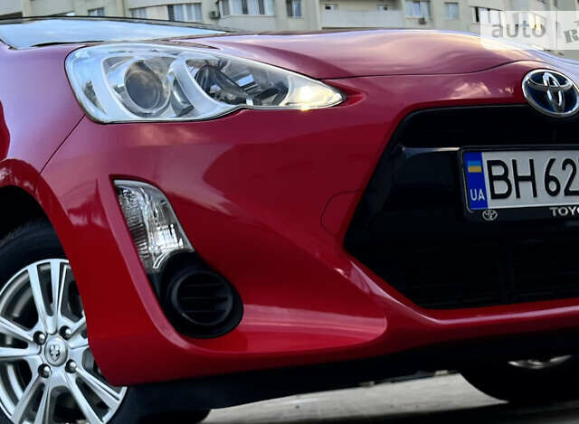 Красный Тойота Aqua, объемом двигателя 1.5 л и пробегом 68 тыс. км за 12300 $, фото 5 на Automoto.ua