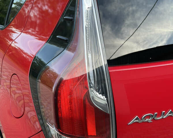 Червоний Тойота Aqua, об'ємом двигуна 1.5 л та пробігом 119 тис. км за 12700 $, фото 36 на Automoto.ua