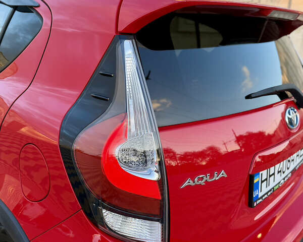 Тойота Aqua 2017 в Одессе на Automoto.ua Красный Тойота Aqua, объемом двигателя 1.5 л и пробегом 80 тыс. км за 13600 $, фото 31 на Automoto.ua