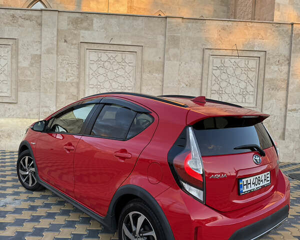 Тойота Aqua 2017 в Одессе на Automoto.ua Красный Тойота Aqua, объемом двигателя 1.5 л и пробегом 80 тыс. км за 13600 $, фото 48 на Automoto.ua