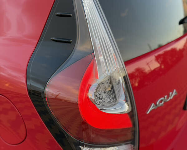 Тойота Aqua 2017 в Одессе на Automoto.ua Красный Тойота Aqua, объемом двигателя 1.5 л и пробегом 80 тыс. км за 13600 $, фото 49 на Automoto.ua