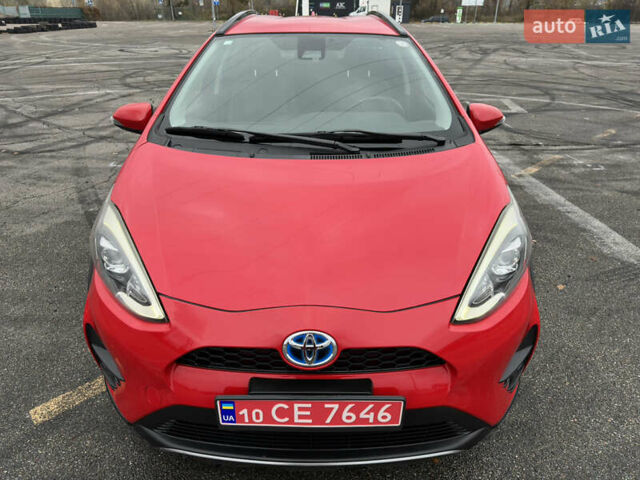 Красный Тойота Aqua, объемом двигателя 1.5 л и пробегом 79 тыс. км за 13700 $, фото 2 на Automoto.ua