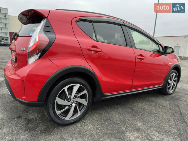 Красный Тойота Aqua, объемом двигателя 1.5 л и пробегом 79 тыс. км за 13700 $, фото 17 на Automoto.ua