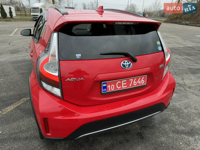 Красный Тойота Aqua, объемом двигателя 1.5 л и пробегом 79 тыс. км за 13700 $, фото 10 на Automoto.ua
