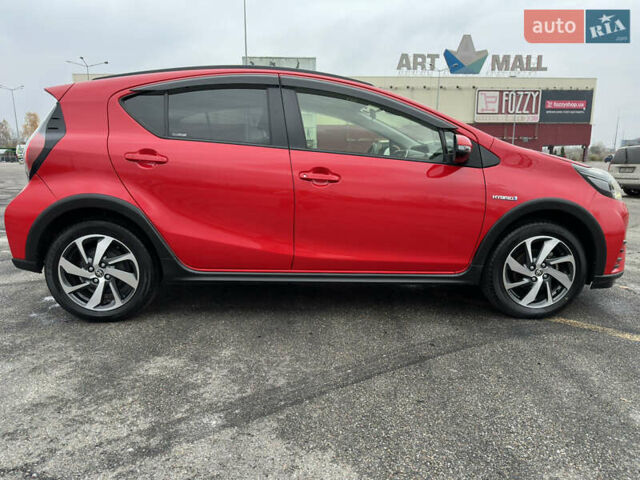 Красный Тойота Aqua, объемом двигателя 1.5 л и пробегом 79 тыс. км за 13700 $, фото 18 на Automoto.ua