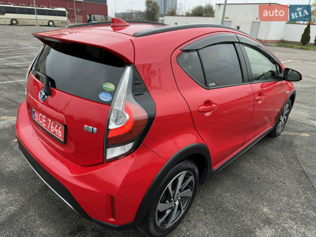 Красный Тойота Aqua, объемом двигателя 1.5 л и пробегом 79 тыс. км за 13700 $, фото 16 на Automoto.ua