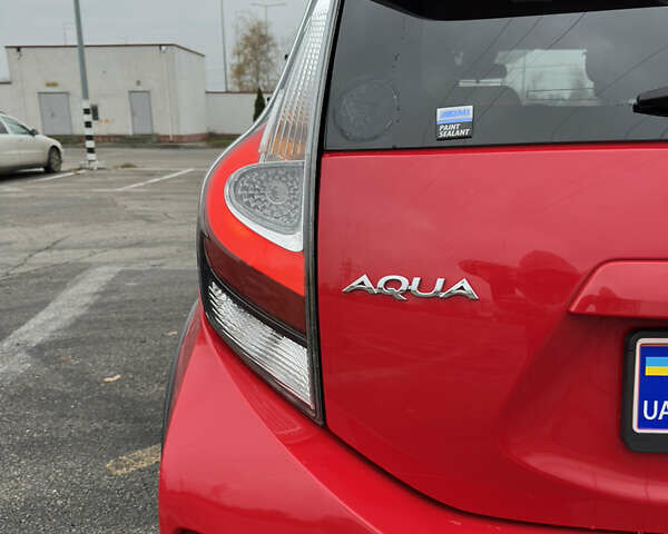 Красный Тойота Aqua, объемом двигателя 1.5 л и пробегом 79 тыс. км за 13700 $, фото 14 на Automoto.ua