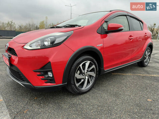 Красный Тойота Aqua, объемом двигателя 1.5 л и пробегом 79 тыс. км за 13700 $, фото 4 на Automoto.ua