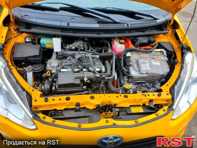 Желтый Тойота Aqua, объемом двигателя 1.5 л и пробегом 72 тыс. км за 10800 $, фото 5 на Automoto.ua