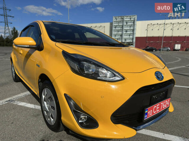 Желтый Тойота Aqua, объемом двигателя 1.5 л и пробегом 82 тыс. км за 13800 $, фото 44 на Automoto.ua