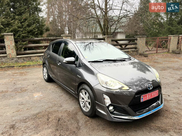 Серый Тойота Aqua, объемом двигателя 1.5 л и пробегом 61 тыс. км за 11400 $, фото 4 на Automoto.ua