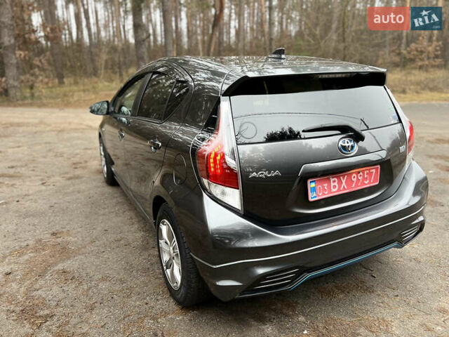Серый Тойота Aqua, объемом двигателя 1.5 л и пробегом 61 тыс. км за 11400 $, фото 10 на Automoto.ua