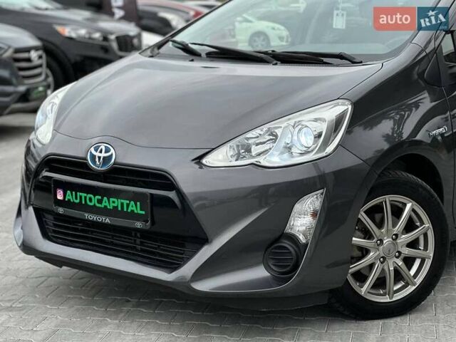 Серый Тойота Aqua, объемом двигателя 1.5 л и пробегом 94 тыс. км за 12990 $, фото 1 на Automoto.ua