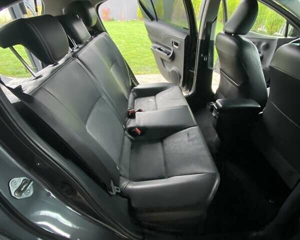 Серый Тойота Aqua, объемом двигателя 1.5 л и пробегом 107 тыс. км за 12100 $, фото 6 на Automoto.ua