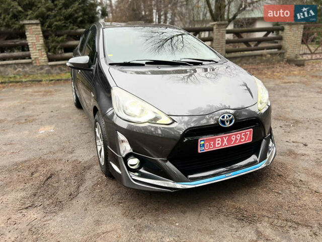 Серый Тойота Aqua, объемом двигателя 1.5 л и пробегом 61 тыс. км за 11400 $, фото 3 на Automoto.ua