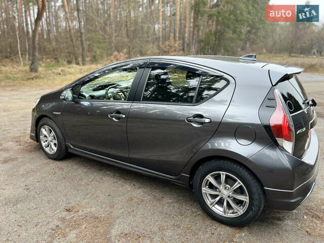 Серый Тойота Aqua, объемом двигателя 1.5 л и пробегом 61 тыс. км за 11400 $, фото 11 на Automoto.ua