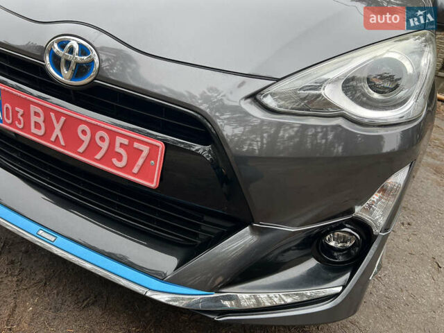 Серый Тойота Aqua, объемом двигателя 1.5 л и пробегом 61 тыс. км за 11400 $, фото 30 на Automoto.ua