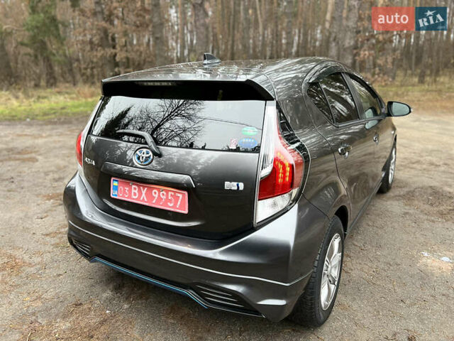 Серый Тойота Aqua, объемом двигателя 1.5 л и пробегом 61 тыс. км за 11400 $, фото 8 на Automoto.ua