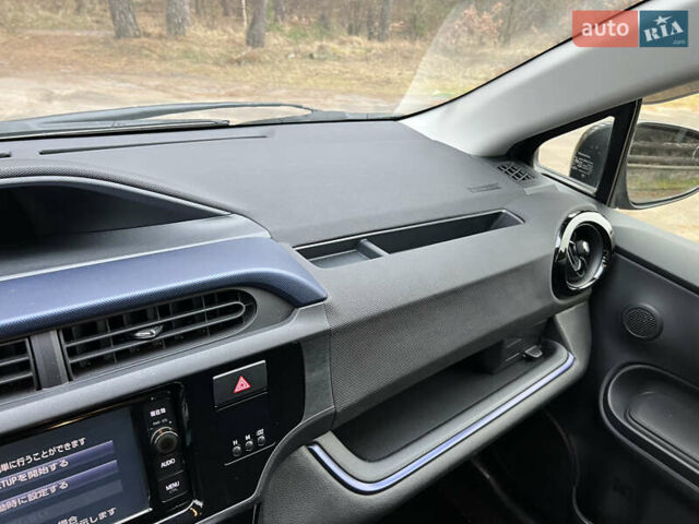 Серый Тойота Aqua, объемом двигателя 1.5 л и пробегом 61 тыс. км за 11400 $, фото 28 на Automoto.ua