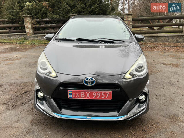 Серый Тойота Aqua, объемом двигателя 1.5 л и пробегом 61 тыс. км за 11400 $, фото 14 на Automoto.ua