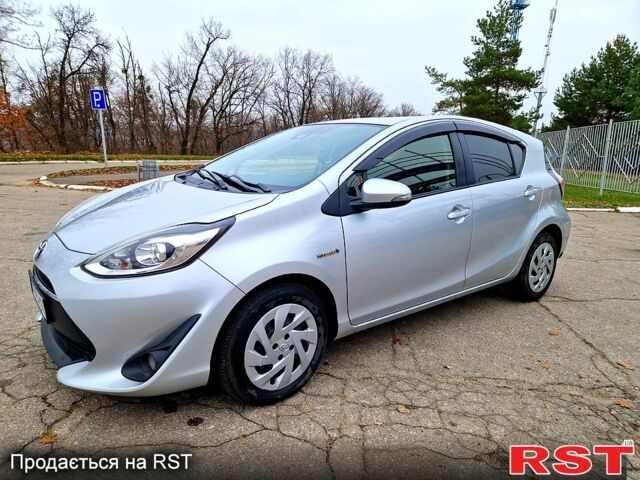 Серый Тойота Aqua, объемом двигателя 1.5 л и пробегом 88 тыс. км за 12500 $, фото 5 на Automoto.ua