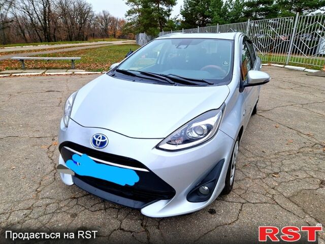 Серый Тойота Aqua, объемом двигателя 1.5 л и пробегом 88 тыс. км за 12500 $, фото 4 на Automoto.ua