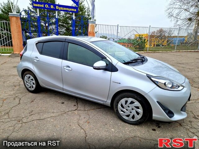 Серый Тойота Aqua, объемом двигателя 1.5 л и пробегом 88 тыс. км за 12500 $, фото 7 на Automoto.ua