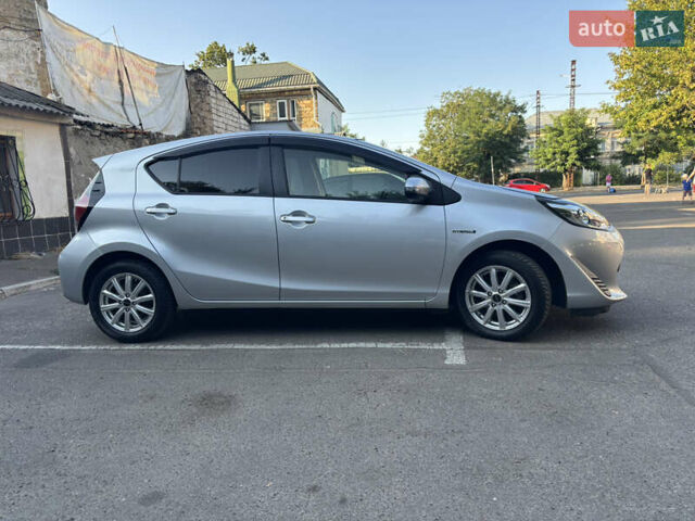 Серый Тойота Aqua, объемом двигателя 1.5 л и пробегом 88 тыс. км за 11400 $, фото 6 на Automoto.ua