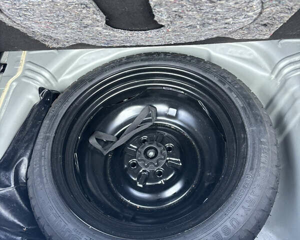 Серый Тойота Aqua, объемом двигателя 1.5 л и пробегом 88 тыс. км за 11400 $, фото 16 на Automoto.ua