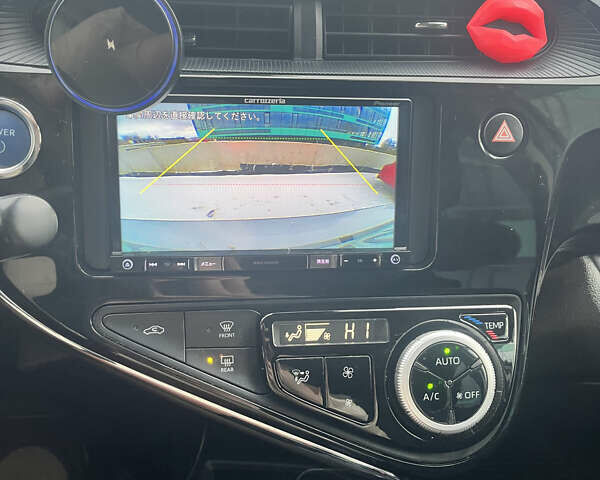 Серый Тойота Aqua, объемом двигателя 1.5 л и пробегом 110 тыс. км за 13200 $, фото 17 на Automoto.ua