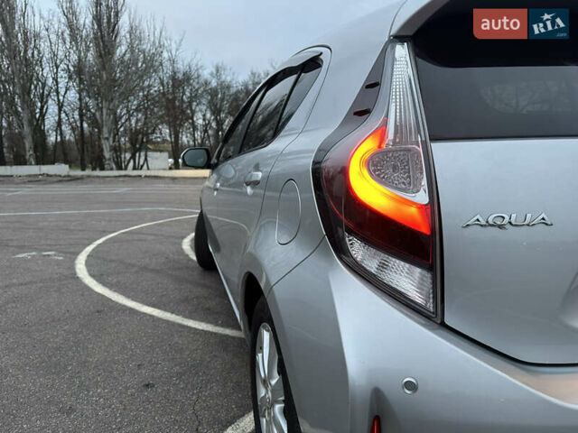 Серый Тойота Aqua, объемом двигателя 1.5 л и пробегом 49 тыс. км за 13500 $, фото 25 на Automoto.ua
