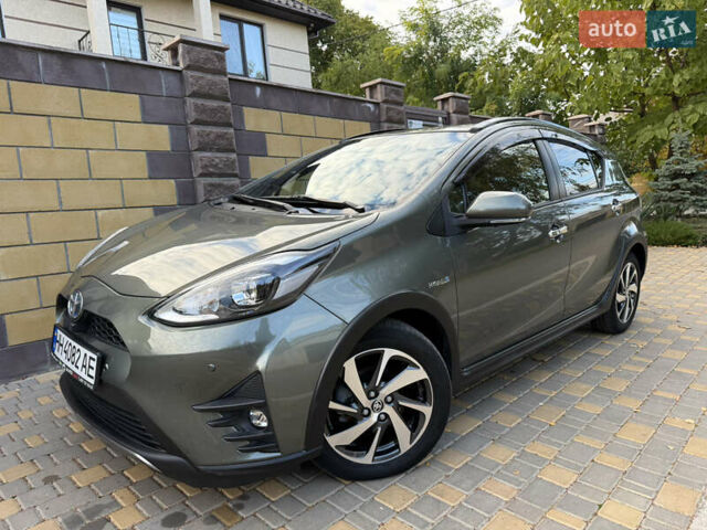 Серый Тойота Aqua, объемом двигателя 1.5 л и пробегом 57 тыс. км за 14900 $, фото 26 на Automoto.ua