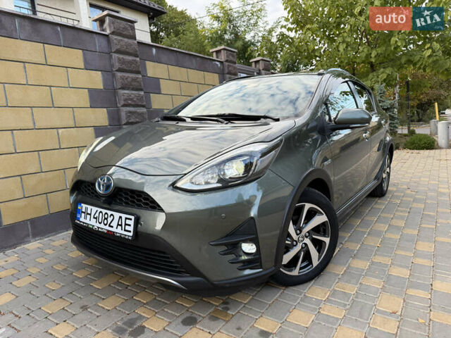 Серый Тойота Aqua, объемом двигателя 1.5 л и пробегом 57 тыс. км за 14900 $, фото 39 на Automoto.ua