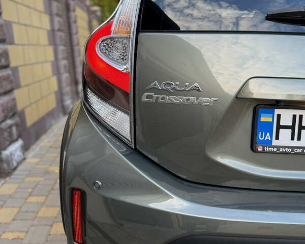 Серый Тойота Aqua, объемом двигателя 1.5 л и пробегом 57 тыс. км за 14900 $, фото 56 на Automoto.ua