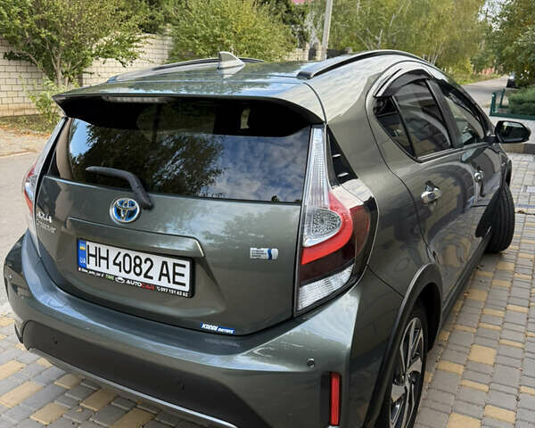 Серый Тойота Aqua, объемом двигателя 1.5 л и пробегом 57 тыс. км за 14900 $, фото 19 на Automoto.ua