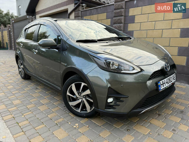 Серый Тойота Aqua, объемом двигателя 1.5 л и пробегом 57 тыс. км за 14900 $, фото 44 на Automoto.ua