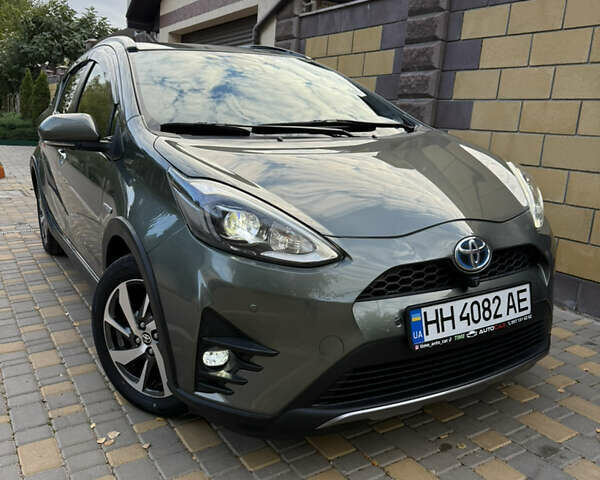 Серый Тойота Aqua, объемом двигателя 1.5 л и пробегом 57 тыс. км за 14900 $, фото 42 на Automoto.ua