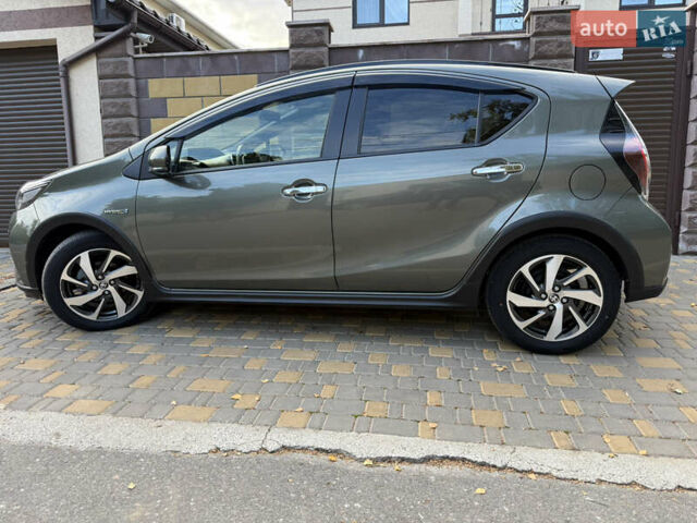 Серый Тойота Aqua, объемом двигателя 1.5 л и пробегом 57 тыс. км за 14900 $, фото 9 на Automoto.ua