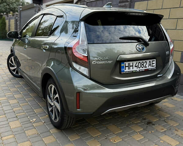 Серый Тойота Aqua, объемом двигателя 1.5 л и пробегом 57 тыс. км за 14900 $, фото 11 на Automoto.ua