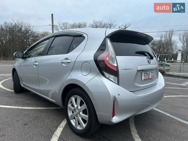 Серый Тойота Aqua, объемом двигателя 1.5 л и пробегом 49 тыс. км за 13500 $, фото 14 на Automoto.ua
