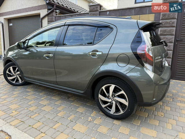 Серый Тойота Aqua, объемом двигателя 1.5 л и пробегом 57 тыс. км за 14900 $, фото 8 на Automoto.ua