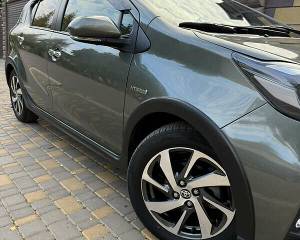 Серый Тойота Aqua, объемом двигателя 1.5 л и пробегом 57 тыс. км за 14900 $, фото 43 на Automoto.ua