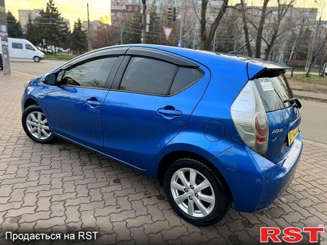 Синий Тойота Aqua, объемом двигателя 1.5 л и пробегом 125 тыс. км за 10350 $, фото 4 на Automoto.ua