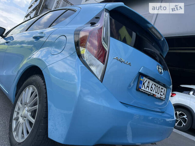 Синий Тойота Aqua, объемом двигателя 1.5 л и пробегом 74 тыс. км за 12500 $, фото 8 на Automoto.ua