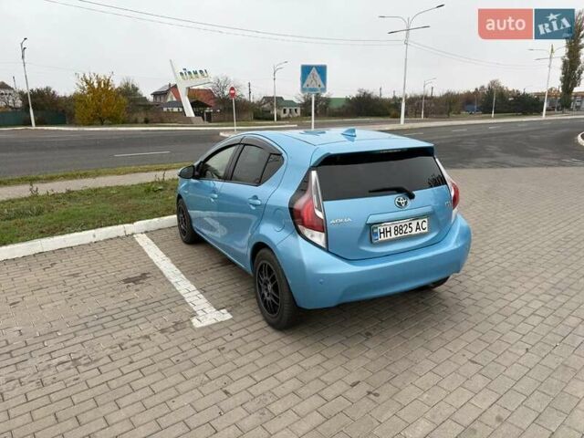 Синий Тойота Aqua, объемом двигателя 1.5 л и пробегом 112 тыс. км за 10500 $, фото 4 на Automoto.ua