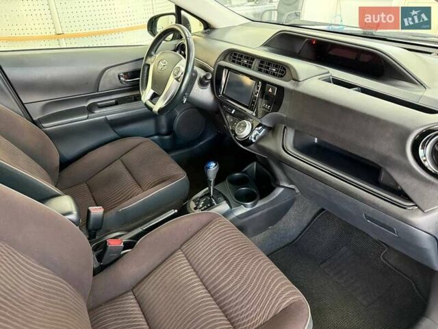 Синий Тойота Aqua, объемом двигателя 1.5 л и пробегом 84 тыс. км за 10790 $, фото 25 на Automoto.ua